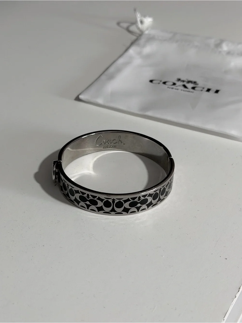 Coach Black and Silver Signature Enamel Bangle Bracelet